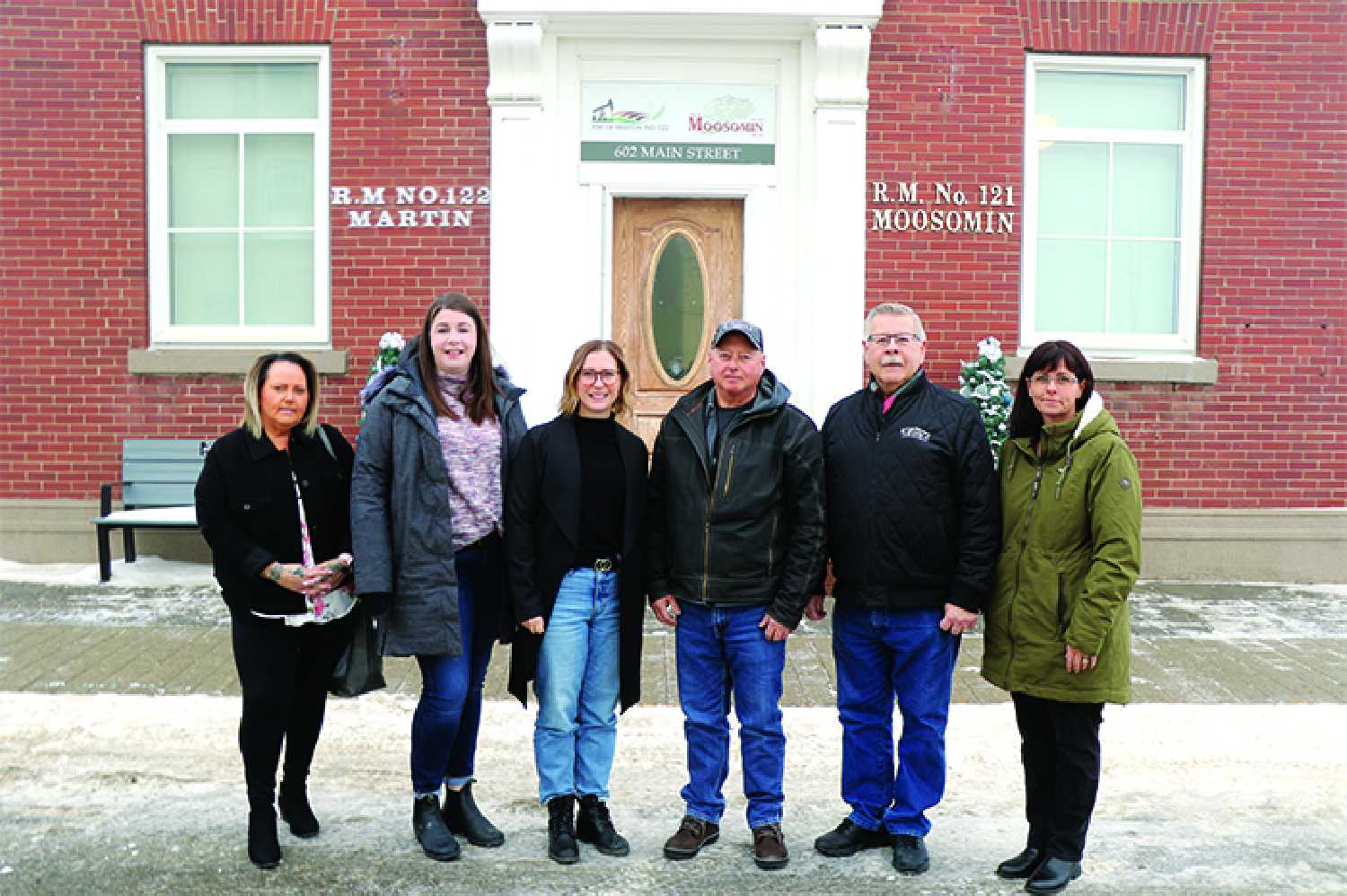 The RM of Moosomin has committed $80,000 over five years to Playfair Daycare for the construction of a second daycare in Moosomin. From left are Terri Lowe, Jill Jones and Jalisa Miller with the daycare fundraising committee, and Jeff McMullen, Herb Doll and Kendra Lawrence with the RM of Moosomin